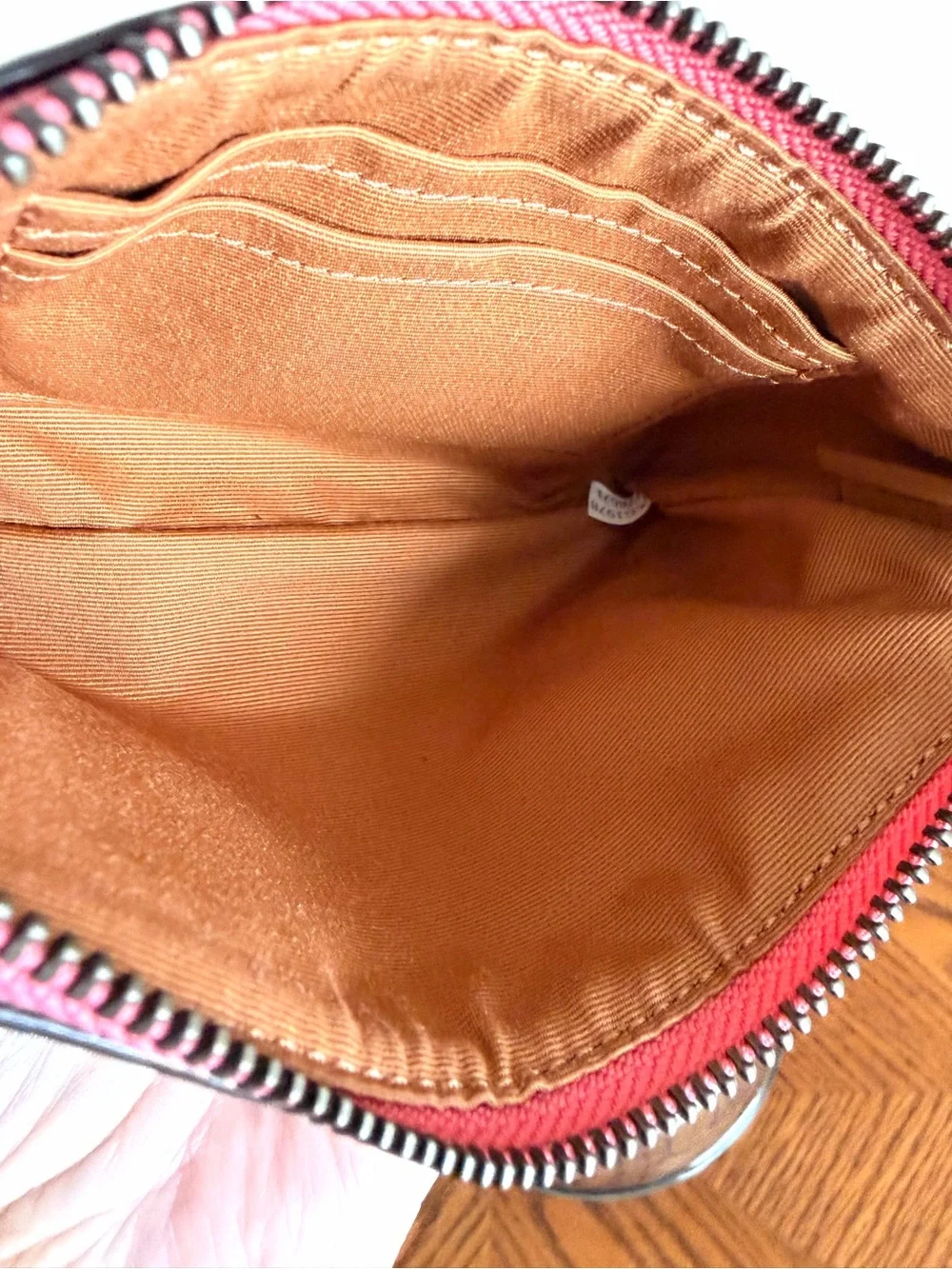 Coach Brown Signature Wristlet with Pink Lip Print near new